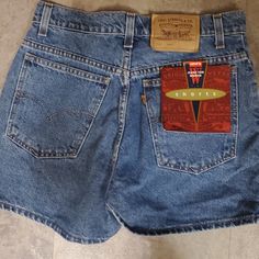 Rare Deadstock Levi's 912 Orange Tab Shorts These Are A Slim Fit Tag States Sz 11 But Measurements Are Listed 14 Flat At Waist So 28 12 Inch Rise 2.5 Inch Inseam Leg Opening 11 Flat Hips 18 These Are A Great Pair Of Vintage Levi's Classic Mid-rise Shorts With Built-in Shorts, High Waist Fitted Jean Shorts With Hip Pockets, High Rise Fitted Shorts With Hip Pockets, Classic Short Bottoms With Hip Pockets, Fitted High Rise Shorts With Hip Pockets, Classic High Waist Jean Shorts With Belt Loops, Classic High Rise Shorts With Pockets, Classic High Waist Jean Shorts, Classic High-rise Shorts With Pockets