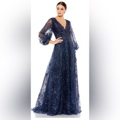 Beautiful Mac Duggal Gown With Sheer Sequin Embellished Embroidery Overlay. 100% Polyester Lining With A Partially Lined Bodice; Fully Lined Through Skirt And Sheer Unlined Puff Sleeves. Approximately 62.5” From Top Of Shoulder To Bottom Of Hem. Style # 20283 Blue Glamorous V-neck Gown, Glamorous Blue V-neck Gown, Blue Embellished V-neck Evening Dress, Blue Embellished Gown For Cocktail, Blue Embellished Cocktail Gown, Embellished Blue Cocktail Gown, Cocktail Embellished Blue Gown, Embellished Embroidery, Mac Duggal Dresses