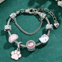 *** Sanrio Licensed** Stainless Steel Hello Kitty Charm Bracelet For Young Girls Or Women Makes Great For Gifts, Birthdays Or Events Or Parties Comes With Gift Bag Or Box !!! *** Sell Out Risk Nwt !!!! I’m A 5 Star Seller And Your Items Will Come Within Days After You Place An Order !!! No Need To Wait For 2 Or 3 Weeks! From Other Sellers Or Platforms! I Have Everything I Post In Stock! Cute Silver Bracelets With Lobster Clasp, Trendy Silver Jewelry With Cat Design, Cute Silver Bracelets With Charms, Cute Silver Bracelet Jewelry, Sanrio Jewelry, Hello Kitty Charm, Zipper Bracelet, Anime Jewelry, Bead Charms Diy