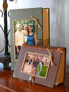 an old photo frame sitting on top of a wooden table