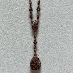 Beautifully Detailed Swirl With Small Flowers And Bronze Crystals, Adjustable Necklace. Bronze Colored, Lightweight, 16” Elegant Adjustable Necklace With Vintage Charm, Elegant Adjustable Vintage Charm Necklace, Elegant Vintage Charm Adjustable Necklace, Elegant Copper Dangle Necklaces, Vintage Copper Necklaces, Elegant Bronze Copper Necklace, Elegant Brown Jewelry With Adjustable Chain, Elegant Copper Filigree Jewelry, Elegant Copper Necklaces For Gifts