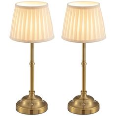 pair of brass table lamps with white shades