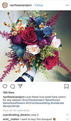 a bouquet of flowers sitting on top of a table next to an instagram page