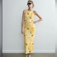 This Stunning Zara Maxi Dress Features A Beautiful Floral Pattern In Shades Of Yellow And Comes In Size Small. The Dress Has A Sleeveless Design With A Round Neckline And A Pullover Closure. It Is Made Of A Polyester Blend Fabric With A Mesh Texture And Features Contrast Lining Accents. Ideal For Travel, Party/Cocktail Events Or Casual Wear, This Dress Has A Dress Length That Is Long And Is Perfect For The Summer And Spring Seasons. The Dress Is Not Vintage And Is Machine Washable For Easy Care. Zara Embroidered Dress, Womens Yellow Dress, Mesh Texture, Sequin Halter Dress, Zara Maxi Dress, Deep V Dress, Black Dress With Sleeves, Tuxedo Dress, Zara Dress