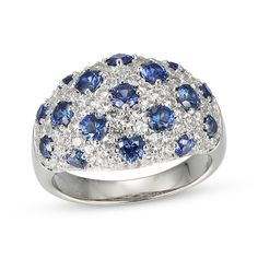 Striking blue and white come together in this fanciful domed cluster ring. Sterling silver Round-cut blue lab-created sapphires dot the cluster of white lab-created sapphires in a symmetrical pattern Elegant Blue Domed Sapphire Ring, Elegant Domed Blue Sapphire Ring, Formal Domed Blue Sapphire Ring, Sterling Silver Sapphire Ring With Pave Setting, Sapphire Cluster Jewelry With Brilliant Cut, Brilliant Cut Sapphire Cluster Jewelry, Brilliant Cut Cluster Sapphire Jewelry, Blue Sapphire Ring With Pave Setting Round Cut, Fine Jewelry Multi-stone Dome Ring