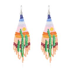 PRICES MAY VARY. 🌈Bohemian Beaded Dangle Earrings: Long beaded statement tassel earrings with cactus pattern, nature seed bead earrings add ease, freedom and enthusiasm to your look. 🌈Size of Tassel Drop Earrings: Long beaded fringe earrings are made of high quality seed beads, each bead is carefully selected and threaded, mini statement bohemian earrings length: 4.7 inch, width: 1.5 inch. 🌈Various Colors to Match Your Clothes: Handmade beaded tassel earrings are compatible with everything in