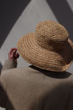 Vintage stunning straw hat with wide brim and tie accent. Favorite classic that can be worn at the beach or around town :) Can be styled with gold toned jewelry and favorite market dresses or over swim. Material not listed, assuming raffia Tag reads Kaminski Australia - Handmade in Madagascar Measures approximately: 22.5" circumference / 5" brim Some light wear to the inner head band - does not affect the overall look or wear. If you would like additional info or images prior to final sale purch Gold Straw Hat With Curved Brim For Vacation, Gold Curved Brim Straw Hat For Vacation, Elegant Gold Sun Hat For Vacation, Gold Wide Brim Straw Hat, Gold Flat Brim Panama Hat For Summer, Gold Short Brim Panama Hat For Summer, Gold Curved Brim Straw Hat For Summer, Gold Straw Hat For Summer, Gold Panama Hat With Flat Brim For Summer