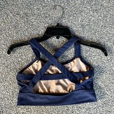 Never Worn Balera Medium Navy Blue Sports Bra, Crop Top, Dance Top Unique Crossing Straps In The Back Great For Dance Class Or Dance Performances Blue Sports Bra With Built-in Bra For Workout, Fitted Blue Activewear With Built-in Padding, Navy Fitted Yoga Activewear, Blue Sports Bra With Built-in Bra For Gym, Blue Fitted Moisture-wicking Crop Top, Blue Sports Bra With Built-in Bra For Yoga, Blue Gym Top With Mesh Back, Blue Stretch Activewear With Built-in Bra, Blue Summer Activewear With Built-in Bra