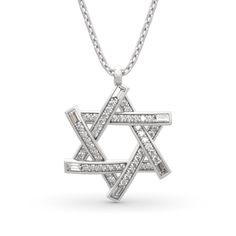 The star of David necklace symbolizes that God rules over the universe and protects us from all directions. A beautiful piece with beautiful meaning. This classic star of David pendant features brilliant stones details in sterling silver. All stones glisten with every beat of her heart. Celebrate your sweetheart with this necklace.Carat Weight: 0.9 ctStone Size: 2.5*1.5,1 mmStone Type: Jeulia® StoneNumber of Stones: 54 Stone Shape: Baguette, RoundStone Color: Diamond WhiteWeight: 4.38 gWidth: 17 Elegant Silver Star Of David Necklace, Silver Star Of David Fine Necklace, Sterling Silver Star Of David Necklace With Polished Finish, Sterling Silver Star-shaped Diamond Necklace, Sterling Silver Star Diamond Necklace With Accents, Silver Diamond Star Of David Necklace, Silver Diamond Necklace In Star Of David Shape, Sterling Silver Star Diamond Necklace, Star-shaped Silver Diamond Necklace For Anniversary