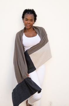 An ultrasoft and stylish scarf made of plush organic cotton is a travel essential and can be used as a shawl or blanket to keep you comfortable anywhere you go. 28" x 78" 100% organic cotton Machine wash, tumble dry Imported Knit Pom Pom Hat, Wrap Clothing, Travel Scarf, Stylish Scarves, Unique Hats, Cotton Throws, Knit Outfit, Cozy Knits, Cashmere Scarf