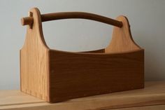 a wooden purse sitting on top of a table