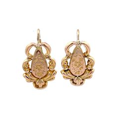 Antique Victorian Floral Earrings in 14k Yellow Gold These antique Victorian drop earrings are a timeless treasure! Crafted from 14 karat yellow gold, these pieces feature beautiful filigree motifs and floral engravings. The earrings measure two inches long and feature a polished yellow gold finish. The intricate filigree motifs are accented with floral engravings for a unique look. The classic drop earrings are perfect for adding a touch of antique elegance to any outfit. These earrings are gre Antique 14k Gold Hallmarked Earrings, Victorian Hallmarked 14k Gold Earrings, Victorian 14k Gold Filigree Earrings, Antique Yellow Gold Drop Earrings, 14k Gold Victorian Filigree Earrings, Vintage Wedding Earrings Engraved, Vintage Engraved Earrings For Wedding, Victorian Yellow Gold Earrings With Intricate Design, Victorian Yellow Gold Drop Earrings