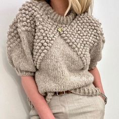 THIS IS A DIGITAL DOWNLOAD KNITTINGPATTERN, no refund on purchase. For more inspiration, see https://www.instagram.com/knit_by_siv/ on instagram  This pattern is available in English. For knitting kit or Norwegian pattern see www.garnhimmelen.no AnnaLena sweater is knitted with popcorn stitches on the frontpiece and sleeves. Sleeves are knitted from the body, so no sewing. Sizes: XS (S/M) L/XL (2XL) Length:   53 (55) 57 (59) cm Sleeves:    27 (27) 28 (28) cm Width:       93 (105) 116 (128) cm Gauge:   On needle 9 mm: 10.5 stitches = 10 cm. Needles:     Needle 8 and 9 mm, 40 and 80 cm YARN:     Drops Wish 500 (500) 550 (550) g (composition, look under yarn) Knitting kit includes knitting pattern In the picture I am wearing size XS in the color beige, Size S/M in the color blue and size S/M Luxury Hand Knitted Winter Knitting Pattern, Chunky Knit Sweater Pattern, Knit Sweater Pattern, Popcorn Stitch, Christmas Knitting Patterns, Chunky Knit Sweater, Lang Yarns, Pattern Brands, Pattern Store