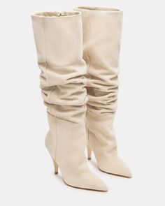 Experience timeless style and ultimate comfort with our BELLAMIE knee-high boot. Featuring a pointed toe and scrunched design, these boots are sure to elevate any outfit. These boots are both fashionable and functional. Perfect for any occasion, these boots are a must-have in your wardrobe. 3.5 inch heel height  16.5 i Cream Suede Boots Outfit, Ivory Knee High Boots Outfit, Beige Suede Boots Outfit, Scrunched Boots, Beige Knee High Boots, Suede Boots Outfit, Beige Suede Boots, Nude Boots, Pointed Boots