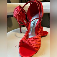 4.5” Heel Color: Pomona Red Brand New, Never Worn Red Open Toe Heels For Prom, Red Synthetic Heels For Party, Red Synthetic Heels For Evening, Elegant Red Synthetic Heels, Red Round Toe Heels For Prom, Red High Heel Heels For Prom, Red High Heels For Prom, Fitted Red Heels For Prom, Red Glitter Heels