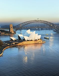 an aerial view of the sydney opera house and harbour bridge