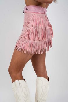 These fun fringe shorts are essential for nights out on the town! The bodice features a metallic fringe detail, a belt, a back zipper closure, and is lined with shorts for comfort. Just add the matching fringe top and you have the perfect party outfit! Returns are for store credit only 95% Polyester 5% Spandex Material has some stretch Model is wearing a small