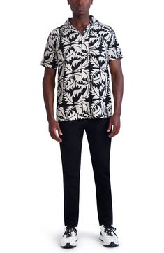 An allover print brings vacation vibes to this short-sleeve shirt. Front button closure Spread collar Short sleeves Chest pocket 100% viscose Machine wash, tumble dry Imported Vacation Graphic Print Collared T-shirt, Summer Printed T-shirt With Camp Collar, Casual Patterned Short Sleeve Shirt For Vacation, Printed Relaxed Fit Hawaiian Shirt Short Sleeve, Printed Relaxed Fit Hawaiian Shirt, Casual Patterned Short Sleeve Shirt For Summer, Short Sleeve Rayon Camp Shirt For Vacation, Casual Printed Short Sleeve Camp Shirt, Casual Printed Rayon Shirt