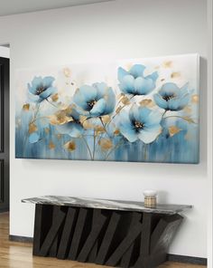 a painting on the wall above a console table