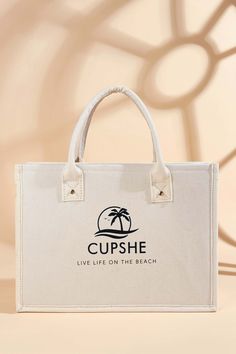 Need the perfect beach accessory? The Cupshe Branded Tote Bag is just what you need. Featuring the Cupshe name, logo, and motto "Live life on the beach," this tote is both stylish and practical! Product code: CAC12C4E003GG Features:  Material: 100%POLYURETHANE. Trendy Canvas Bag For Beach Season, Trendy Canvas Shoulder Bag For Beach Season, Beach Canvas Bag With Double Handle, Casual Beach Bag With Letter Print For Daily Use, Trendy Canvas Beach Bag For Beach Season, Casual Beach Shoulder Bag With Letter Print, Vacation Rectangular Shoulder Bag With Letter Print, Everyday Beach Season Bag With Letter Print, Rectangular Shoulder Bag With Letter Print For Vacation