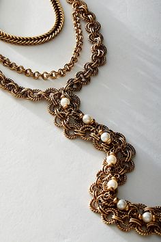 Absolutely adorn your neck with this chunky, layered chain necklace. **Features:** Layered style, multi-chain design, dangling centerpiece, chain fringe, adjustable clasp closure **Why We | Evelyn Necklace by Free People in Gold Metal Lariat Necklace With Double Chain, Metal Lariat Layered Necklace With Chain, Bohemian Pearl Chain Necklace For Party, Elegant Metal Layered Necklace With Chain, Elegant Layered Dangle Chain Necklace, Elegant Multi-strand Double Chain Necklace, Bohemian Multi-strand Double Chain Necklace, Elegant Metal Layered Necklace With Dangle, Elegant Metal Layered Dangle Necklace