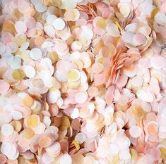 a pile of pink and gold confetti