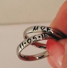 "These Stainless Steel rings are super shiny and a petite 3 mm wide, with a rounded edge. The letters y, p, and j do NOT do well on this rounded ring therefore I suggest if you have these letters in your name that you order the 3 mm flat ring available on my page. These rings are comfortable for stacking up to 4 rings. I can personalize with names, dates, quotes or roman numerals or scripture. Great to wear with your diamond or use as a thumb ring also. These rings also come in Gold and Rose Gol Adjustable Stackable Initial Ring, Minimalist Stackable Initial Ring For Promise, Minimalist Stackable Initial Promise Ring, Adjustable Stackable Rings With Custom Name, Custom Name Adjustable Stackable Rings, Dainty Adjustable Rings For Promise Occasion, Dainty Personalized Initial Ring With Round Band, Dainty Adjustable Ring For Promise, Personalized Dainty Initial Ring