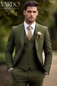 a man in a green suit and tie