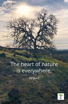 a tree on top of a hill with a quote about the heart of nature is everywhere