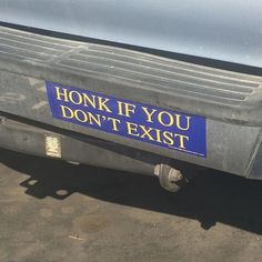 a sign on the back of a truck that says honk if you don't exit