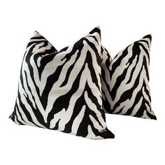 two black and white zebra print pillows