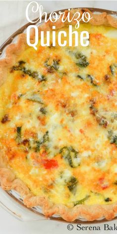 a cheesy quiche with spinach and cheese in a glass pie dish