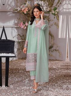 Semi-stitched Traditional Wear With Lace Work For Eid, Festive Semi-stitched Cutwork Kurta, Traditional Embroidered Dress With Sheer Dupatta For Wedding, Semi-stitched Salwar Kameez With Lace Work, Anarkali Salwar Kameez With Lace Work For Reception, Anarkali Dress With Intricate Embroidery In Cambric, Bollywood Style Salwar Kameez With Lace Work For Reception, Unstitched Chikankari Embroidery Dress For Eid, Bollywood Style Lace Work Salwar Kameez For Reception