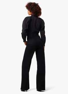 The high-rise, wide leg Mia jean has the comfort and ease of stretch. In an authentic jet black, these jeans are a seasonless, of-the-moment style.This style runs small. Please size up for a better fit. 11 1/2" RISE34" INSEAM63% Cotton, 35% Lyocell, 2% ElastaneMODEL IS WEARING SIZE 26 11 1/2" front rise 15 3/4" back rise 23" leg opening 34" inseam Washed Black Flare Jeans For Workwear In Fall, Versatile Black Jeans For Fall, Black Mid-rise Jeans For Business Casual, Black Jeans With Five Pockets For Business Casual, Washed Black Wide Leg Jeans For Work, Mid-rise Flare Jeans In Washed Black For Work, Washed Black Flare Jeans With Five Pockets For Work, Black Mid-rise Flare Jeans For Work, Washed Black Flare Jeans For Workwear