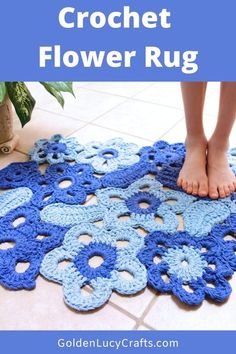 a person standing on top of a blue crochet rug next to a potted plant