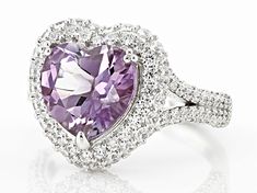 Indulge in the enchanting allure of romance with this captivating Judith Ripka Amethyst With Cubic Zirconia Rhodium Over Sterling Silver Romance Heart Ring. The delicate lavender hues of 2.2ctw amethyst elegantly complement the sparkling white brilliance of 2.5ctw cubic zirconia, creating a mesmerizing symphony that adorns your finger like poetry in motion. Crafted to perfection by Judith Ripka herself, this ring is not just an accessory but a statement piece that speaks volumes about elegance a Dazzling Cubic Zirconia Amethyst Wedding Ring, Heart-shaped Silver Amethyst Ring, Heart-shaped Amethyst Ring For Wedding, Fine Jewelry, Judith Ripka Ring, Heart-shaped Amethyst Ring In Sterling Silver, Judith Ripka, Statement Pieces, Heart Ring, Cubic Zirconia