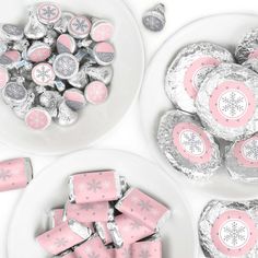 two plates with pink and silver candy on them