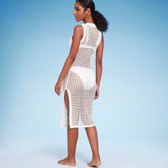 This Crochet Cover-Up Midi Dress from Shade & Shore™ will keep you looking and feeling your best before and after swimming. Made from breathable 100% cotton in an off-white hue, this crochet cover-up dress features a slightly sheer construction with holes to show off the stylish swimsuit you're wearing underneath. Designed in a midi length, it's the perfect pick for beach vacations or days spent relaxing by the pool. Shade & Shore™: Found exclusively at Target. White Crochet Beachwear Dress For Beach Party, White Cotton Poolside Cover-up, White Cotton Cover-up For Poolside, Fitted White Cover-up For Beach Season, White Stretch Dress For Beach Party, White Cotton Cover-up For Warm Weather, White Stretch Beachy Cover-up, White Stretch Cover-up For Beach Party, White Crochet Dress For Poolside And Beach Season