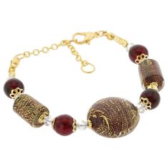 This gorgeous Venetian bracelet in classic Venetian palette of red and gold is a unique piece of jewelry created for the discerning woman by the famous Murano glass masters in their tradition of artistic elegance and exquisite workmanship. It is 100% handcrafted using centuries-old original Murano Glass techniques. This Murano Glass bracelet features beautiful red color that will never fade, and a combination of original Murano beads infused with 24K gold foil for a look which evokes the unique Luxury Red Beaded Bracelets, Elegant Red Round Bead Bracelets, Elegant Red Round Beaded Bracelets, Elegant Red Gold Bangle Bracelet, Elegant Red Bangle Gold Bracelet, Elegant Red Bracelet For Gift, Elegant Red Gold Bracelet For Formal Occasions, Red Adjustable Beaded Bracelets For Formal Occasion, Red Adjustable Beaded Bracelets For Formal Wear