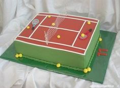 a tennis court cake on a green plate