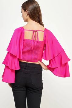 Trumpet sleeve top in stretch satin fabric. This crop top features a sweetheart neckline and long tiered trumpet sleeves. For a comfortable and flattering fit, smocking adorns the back, paired with a high back tie. The playful and flowy sleeves will make any outfit stand out! Questions about fit? Email Support@LillaCavallo.com for additional help with choosing the perfect size for you! Trumpet Sleeve Top, Stretch Satin Fabric, Trumpet Sleeves, Satin Crop Top, Trumpet Sleeve, Flowy Sleeves, Stretch Satin, Crop Top Blouse, Satin Fabric