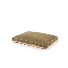 a brown dog pillow with a tan border on the front and bottom, sitting on a white background