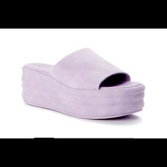 New With Tag Wedge Sandals Slip On Style Wide Front Strap 2 1/2” Wedge Color Lavender *Color May Vary Due To Light Purple Wedge Heel Sandals In Synthetic Material, Purple Open Toe Synthetic Wedge Sandals, Purple Synthetic Wedge Heel Sandals, Casual Purple Wedge Sandals For Summer, Purple Wedge Sandals For Summer, Purple Wedge Heel Sandals For Summer, Purple Wedge Heel Sandals For Beach, Purple Summer Wedge Sandals, Summer Purple Wedge Sandals