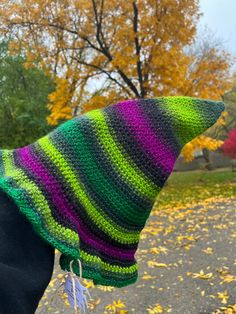 a person wearing a colorful knitted hat