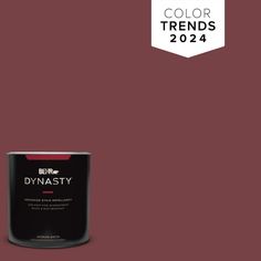 a can of paint with the words color trend in white on it and a red background