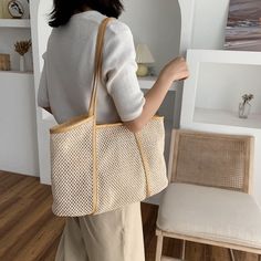 Brand Name: MR.YLLSShape: Casual ToteHandbags Type: Shoulder BagsTypes of bags: Shoulder HandbagsOrigin: CN(Origin)Main Material: StrawClosure Type: HaspHardness: SOFTExterior: NONEStyle: CasualOccasion: VersatileGender: WOMENPattern Type: SolidNumber of Handles/Straps: TwoInterior: No PocketDecoration: Hollow OutItem Type: HandbagsColor: beige bag,black bag,purple bag,yellow bagbag 1: women's bag 2020bag 2: summer bag for women 2020bag 3: bags for women 2020bag 4: wicker woven rattan bagbag 5: Headwear Fashion, Rattan Handbags, Summer Beach Bag, Purple Bag, Beige Bag, Straw Tote Bag, Rattan Bag, Plaid Mini Skirt, Purple Bags