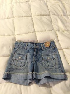 HI, YOU ARE BIDDING ON THIS NEW YOUTH OLD NAVY BLUE DENIM JEAN SHORTS SIZE 6 HIPSTER! NEW WITH TAGS! IN GOOD CONDITION! SIZE 6 HIPSTER WAIST MEASURES ABOUT 12” WIDE AND 10.5” LONG NICE DEAL! SEE MY OTHER ITEMS! WOW! GREAT BUY! SEE PICTURES! I DO COMBINE SHIPPING BUT THE FINAL COST DEPENDS ON THE FINAL WEIGHT AND ZIPCODE. SEE MY OTHER AUCTIONS! THIS AUCTION STARTS AT THIS AMAZING LOW PRICE!!!!!!! THIS AUCTION WILL ALSO SHIP VIA USPS WITH FREE DELIVERY CONFIRMATION!! (2015-GABRIEL/GRETEL)   THERE Cute Denim Blue Cotton Shorts, Cute Cotton Cutoff Shorts, Cute Denim Jean Shorts, Cute Medium Wash Denim Shorts, Cute Denim Jean Shorts In Medium Wash, Cute Medium Wash Denim Jean Shorts, Y2k Outfits Party, Plus Size Y2k Outfits, Y2k Outfits Plus Size