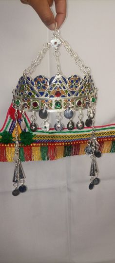 Berber Headdress, "TAWNZA" Berber Head Ornament Plated silver, enamel, and glass beads - AGADIR region Features ✧ Material ◈: plated silver ◈ region: Africa, North Africa, Maghreb, Morocco, Draa Valley Culture ◈: African, Berber, Tuareg Vernacular name ◈: tawnza ◈ use: women's adornment ◈ technique: silver and bronze Weight ◈: 200g Length ◈: 24 cm Width ◈: 26 cm Amazigh Jewelry, Tuareg Jewelry, Head Jewelry, North Africa, Silver Enamel, Headdress, Tiara, Hair Pins, Glass Beads