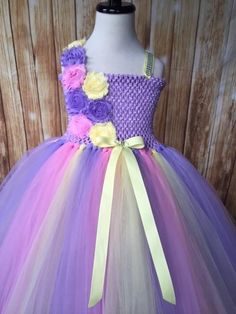 FREE SHIPPING on all orders within the US, no coupon code needed! Lavender Tutu dress by Little Ladybug Tutus. Handmade Tutus for girls specializing in birthday party dresses, Halloween costumes, flower girl dresses, pageant tutus, 1st birthday tutus, and blinged Converse sneakers. We accept custom orders! ORDER PRODUCTION TIME Please check the top of our website's home page for current turn around time. Since all items are handmade at the time of purchase, there is a production time that varies Lavender Princess Dress For Dress-up, Lavender Princess Dress For Dress-up Occasions, Lavender Fitted Princess Dress For Dress-up, Purple Princess Dress For Spring, Purple Princess Dress For Spring Dress-up, Purple Princess Dress For Dress-up In Spring, Purple Princess Dress For Summer Dress-up, Purple Princess Dress For Summer, Purple Spring Birthday Dress