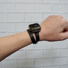 Apple watch bands that are as unique as you are and customized to fit your lifestyle. Love your Apple Watch but want more style than the sport band? This iWatch band is the solution for you! Dress up your Apple Watch in a classic, modern style with this lovely double wrap black leather strap/band attachment with Space Gray accents and Space Gray buckle and included adapters (All Series of Apple Watches Available). This is a great band for everyday wear that will dress up a pair of jeans and tuni Modern Adjustable Bracelet Strap Watch Band, Modern Adjustable Wristband With Bracelet Strap, Adjustable Black Rectangular Watch Band, Adjustable Rectangular Black Watch Band, Modern Adjustable Apple Watch Band With Wrist Strap, Adjustable Modern Apple Watch Band With Wrist Strap, Modern Adjustable Leather Strap Watch Bands, Adjustable Black Apple Watch Band, Minimalist Adjustable Watches For Everyday Use